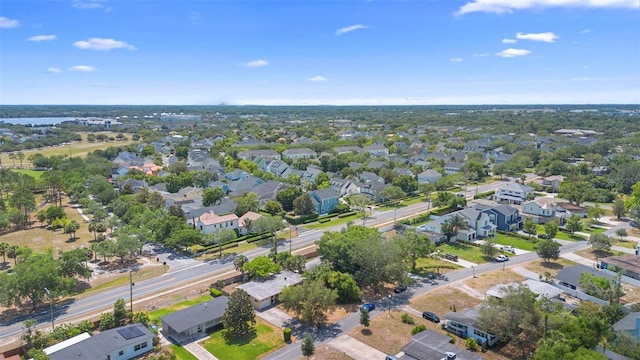 aerial overview of property's location featuring nearby suburban area