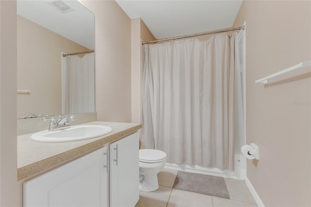 full bathroom featuring tile patterned flooring, toilet, and vanity
