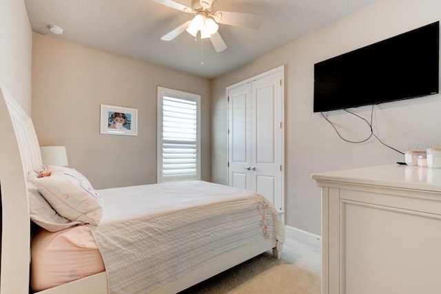 133 Azure Mist Way, Daytona Beach, FL 32124 - bedroom with light carpet, a closet, and a ceiling fan