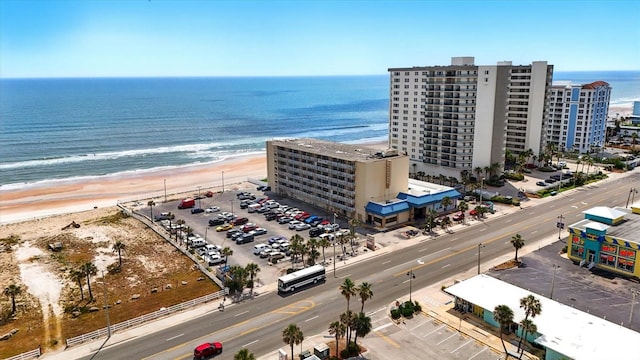 bird's eye view of expansive beach and apartment complex / building