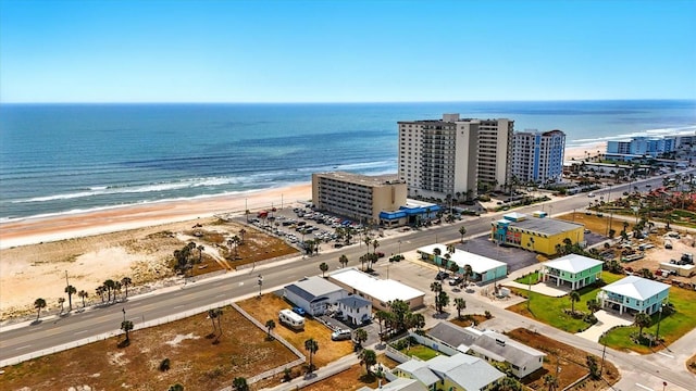 bird's eye view of waterfront with a beach