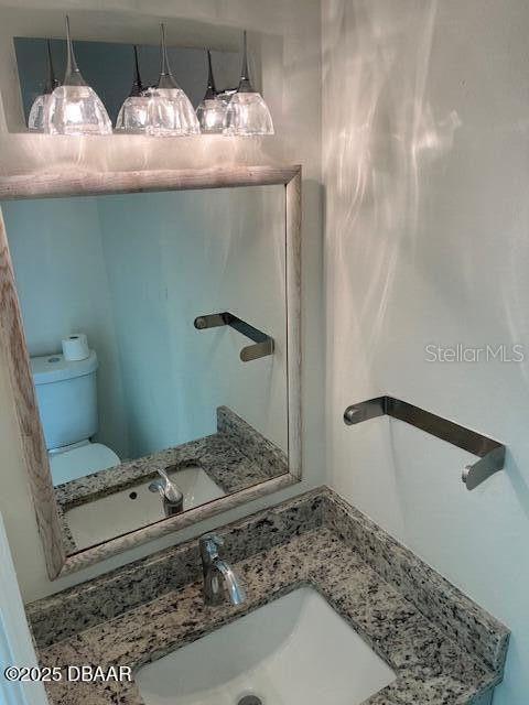 908 Boulder Dr, South Daytona, FL 32119 - half bath with toilet and vanity