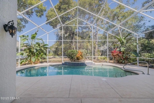 3601 Galway Ln, Ormond Beach, FL 32174 - outdoor pool featuring glass enclosure and a patio area