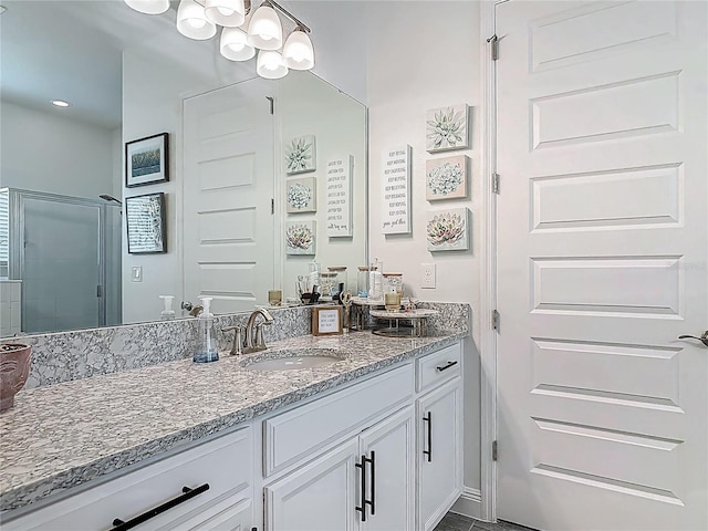 409 Nowell Loop, Deland, FL 32724 - full bathroom with a shower stall, vanity, and a chandelier