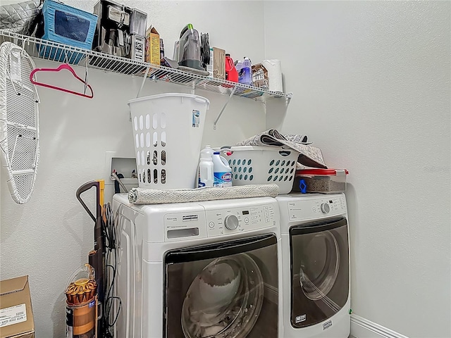 409 Nowell Loop, Deland, FL 32724 - washroom with separate washer and dryer and baseboards