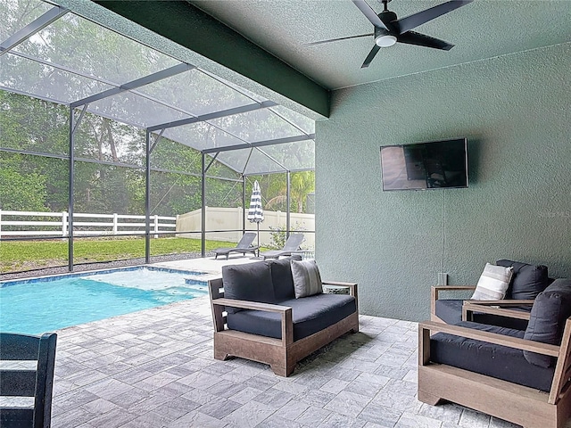 409 Nowell Loop, Deland, FL 32724 - view of patio / terrace featuring a fenced backyard, ceiling fan, and glass enclosure