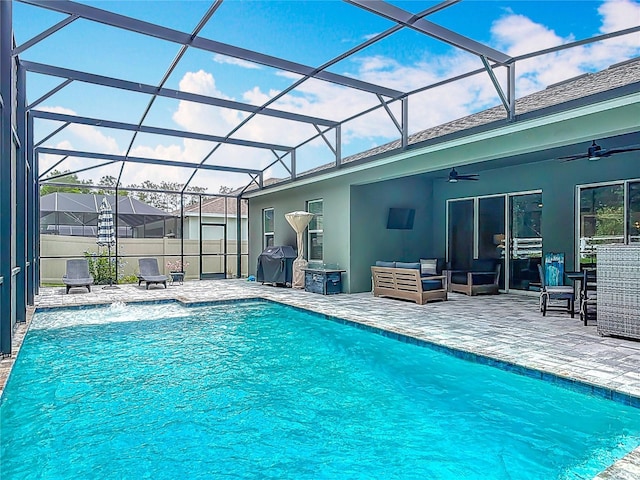 409 Nowell Loop, Deland, FL 32724 - view of swimming pool featuring ceiling fan, a patio, outdoor lounge area, and a grill