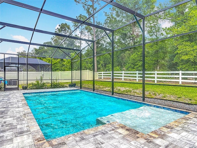 409 Nowell Loop, Deland, FL 32724 - view of swimming pool with a fenced backyard, a patio, and a lanai