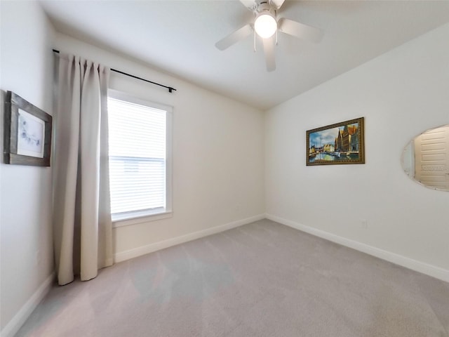 409 Nowell Loop, Deland, FL 32724 - empty room featuring carpet, a ceiling fan, and baseboards