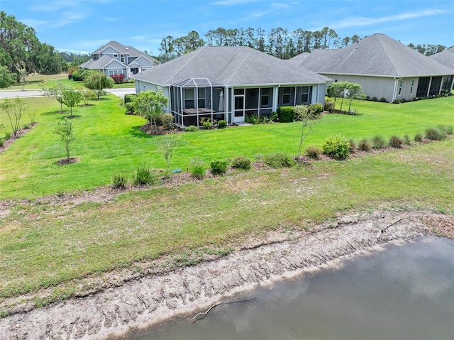 3322 Modena Way, New Smyrna Beach, FL 32168 - rear view of house with a lawn and a lanai