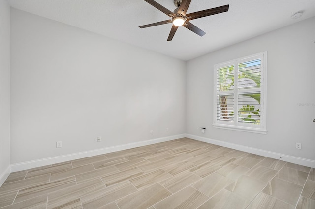 3322 Modena Way, New Smyrna Beach, FL 32168 - empty room with ceiling fan, baseboards, and a smoke detector