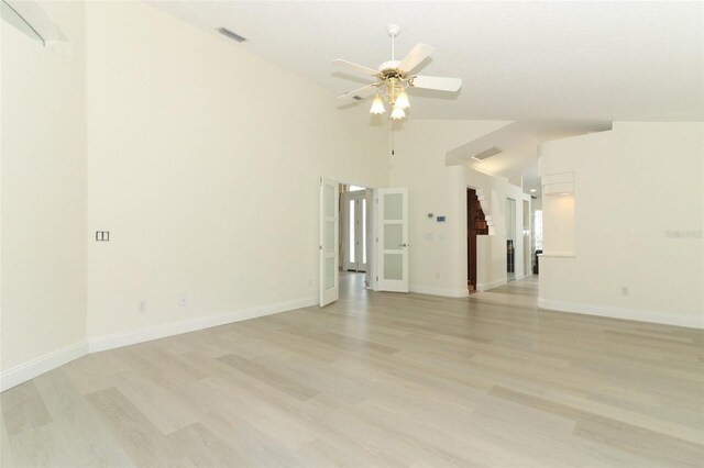 340 Hampton Hills Ct, Debary, FL 32713 - unfurnished room with ceiling fan, light wood finished floors, baseboards, and high vaulted ceiling