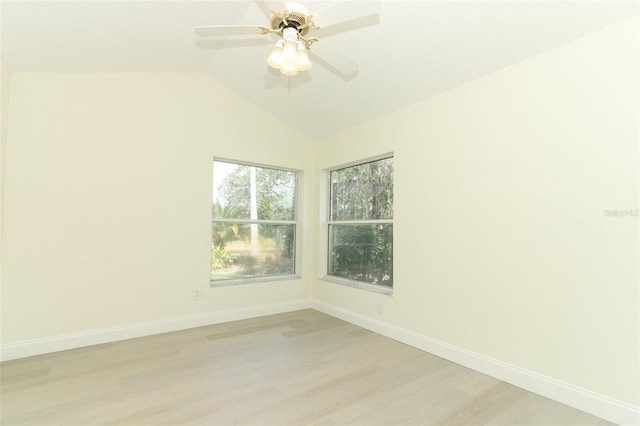 340 Hampton Hills Ct, Debary, FL 32713 - spare room featuring light wood-type flooring, baseboards, vaulted ceiling, and a ceiling fan