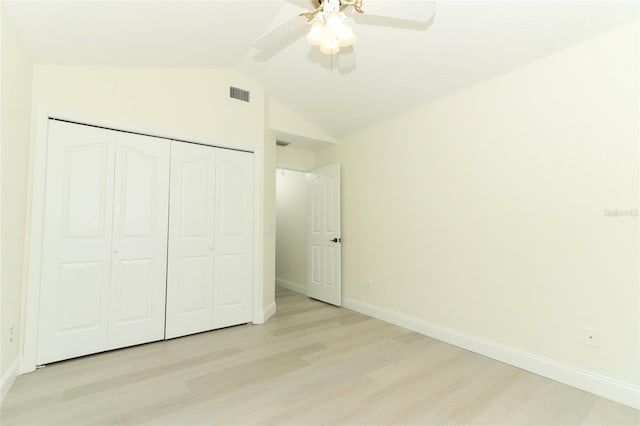 340 Hampton Hills Ct, Debary, FL 32713 - unfurnished bedroom with light wood finished floors, lofted ceiling, baseboards, a closet, and ceiling fan
