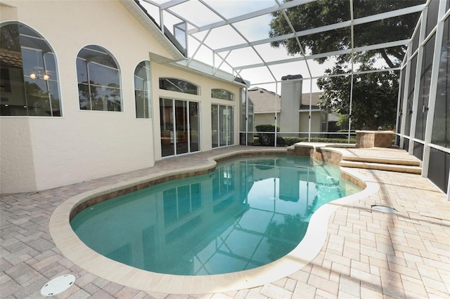 340 Hampton Hills Ct, Debary, FL 32713 - view of pool with a patio area, a lanai, and a pool with connected hot tub