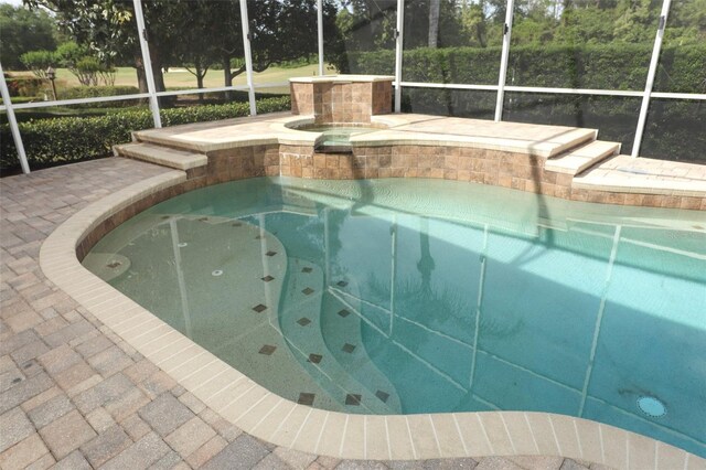 340 Hampton Hills Ct, Debary, FL 32713 - swimming pool with an in-ground hot tub and glass enclosure