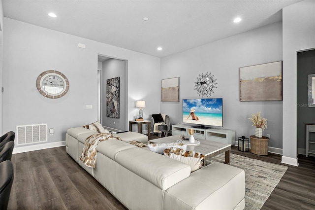 165 Azure Mist Way, Daytona Beach, FL 32124 - living area with dark wood-style floors, recessed lighting, and baseboards