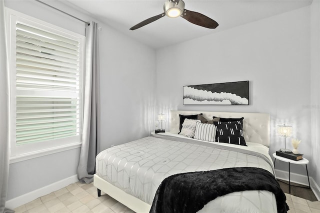 165 Azure Mist Way, Daytona Beach, FL 32124 - bedroom featuring baseboards and ceiling fan