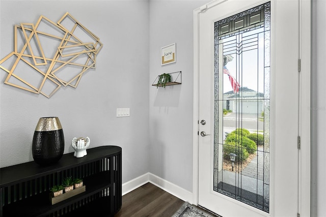 165 Azure Mist Way, Daytona Beach, FL 32124 - doorway to outside with baseboards and dark wood-style flooring