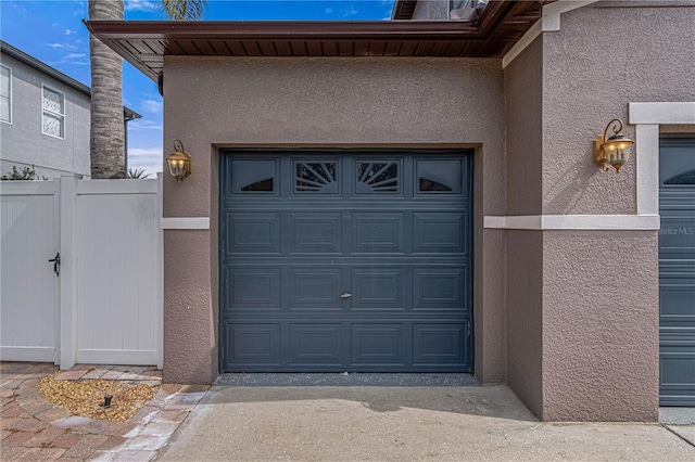 4604 Barbados Loop, Clermont, FL 34711 - garage featuring fence and a gate