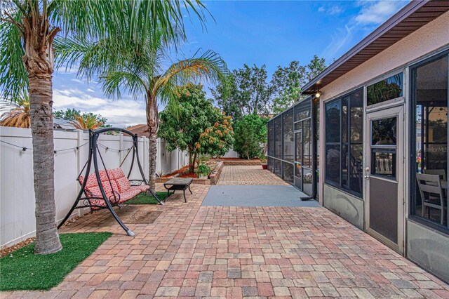 4604 Barbados Loop, Clermont, FL 34711 - view of patio featuring a fenced backyard and a gate