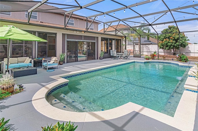 4604 Barbados Loop, Clermont, FL 34711 - view of swimming pool featuring a patio area, outdoor lounge area, fence, and glass enclosure