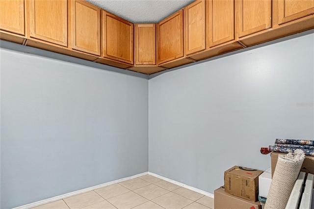 4604 Barbados Loop, Clermont, FL 34711 - washroom featuring light tile patterned flooring and baseboards