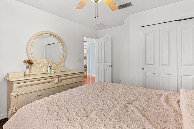 4604 Barbados Loop, Clermont, FL 34711 - bedroom with a closet, baseboards, a ceiling fan, and wood finished floors