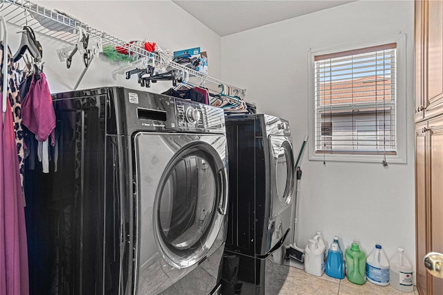 4604 Barbados Loop, Clermont, FL 34711 - laundry room featuring independent washer and dryer and tile patterned floors