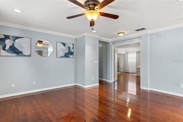 4604 Barbados Loop, Clermont, FL 34711 - empty room with ceiling fan, wood finished floors, a textured ceiling, baseboards, and crown molding