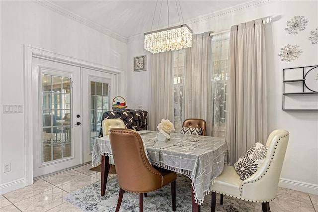 4604 Barbados Loop, Clermont, FL 34711 - dining room with baseboards, a chandelier, french doors, and ornamental molding