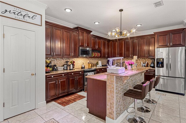 4604 Barbados Loop, Clermont, FL 34711 - kitchen with stainless steel appliances, decorative light fixtures, ornamental molding, tasteful backsplash, and a chandelier