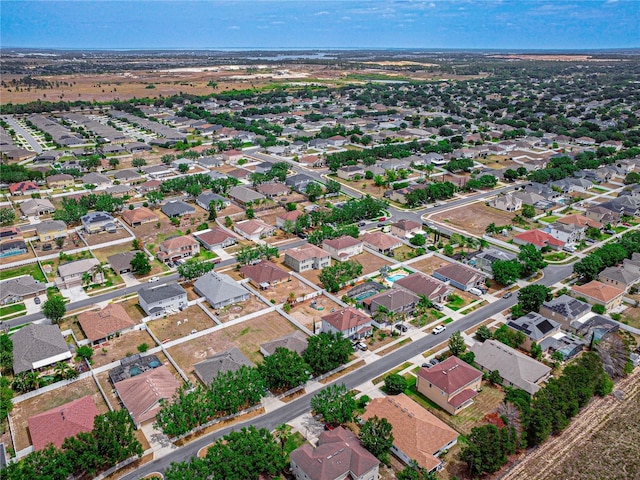 4604 Barbados Loop, Clermont, FL 34711 - aerial view of property and surrounding area featuring nearby suburban area