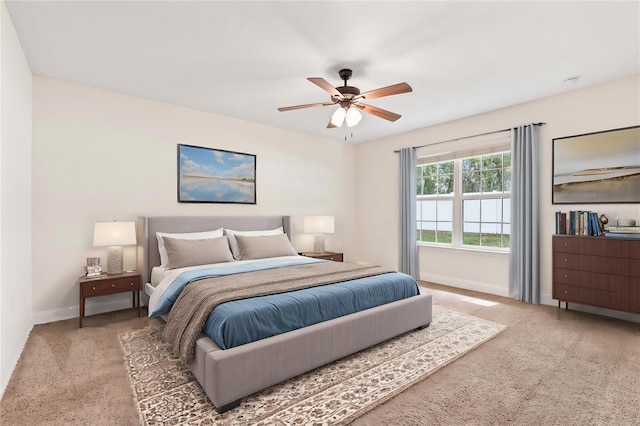 703 Elkhorn Fern Ln, Deland, FL 32720 - bedroom featuring carpet, baseboards, and a ceiling fan