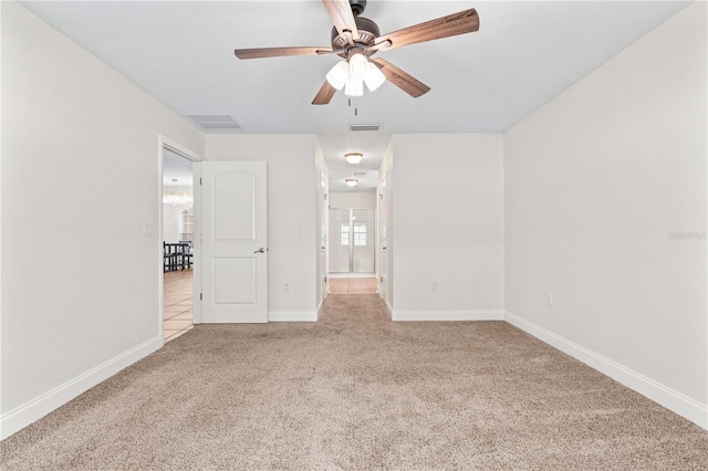 703 Elkhorn Fern Ln, Deland, FL 32720 - carpeted spare room with ceiling fan and baseboards