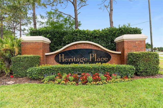 703 Elkhorn Fern Ln, Deland, FL 32720 - community sign with a lawn