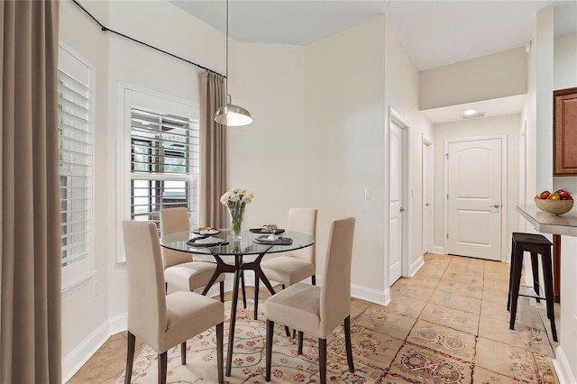 703 Elkhorn Fern Ln, Deland, FL 32720 - dining space featuring baseboards and light tile patterned floors