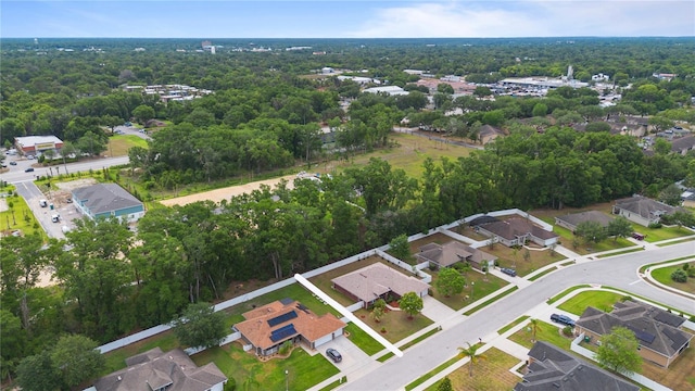 703 Elkhorn Fern Ln, Deland, FL 32720 - aerial view of residential area featuring a forest