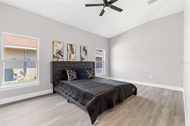 1738 Palm Rd, Ormond Beach, FL 32174 - bedroom with lofted ceiling, wood finished floors, baseboards, and a ceiling fan
