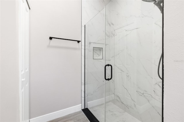 1738 Palm Rd, Ormond Beach, FL 32174 - bathroom featuring a marble finish shower and baseboards