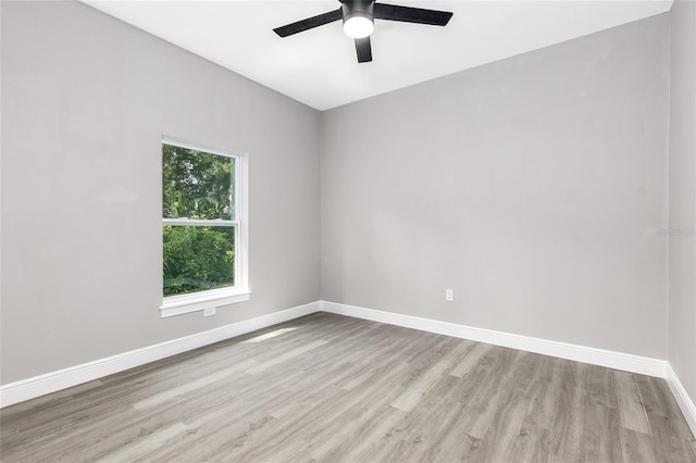 1738 Palm Rd, Ormond Beach, FL 32174 - empty room featuring wood finished floors, a ceiling fan, and baseboards