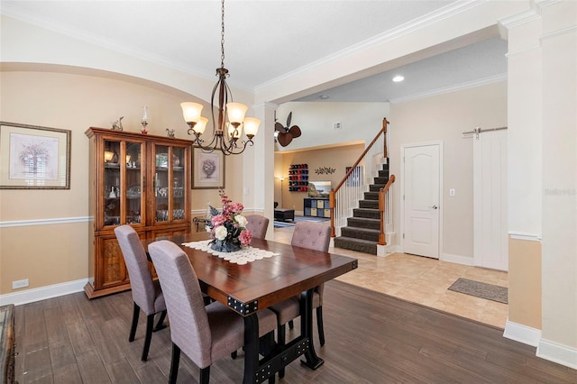 123 Ivydale Manor Dr, Deland, FL 32724 - dining area featuring a chandelier, dark wood-style flooring, stairs, baseboards, and recessed lighting