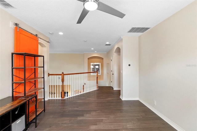 123 Ivydale Manor Dr, Deland, FL 32724 - unfurnished room featuring a ceiling fan, wood finished floors, arched walkways, recessed lighting, and baseboards