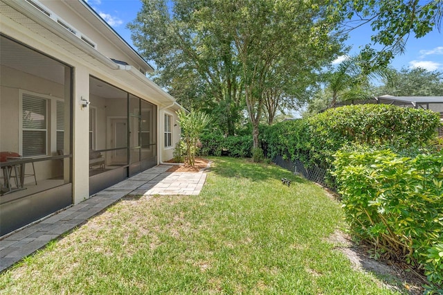 123 Ivydale Manor Dr, Deland, FL 32724 - view of yard with a sunroom and a patio area