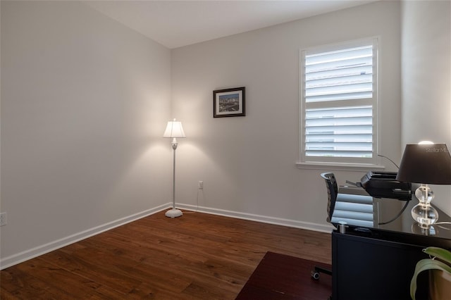 office with wood finished floors and baseboards