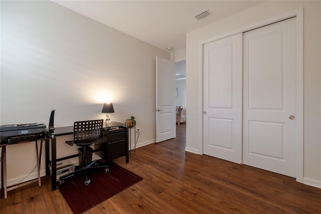 office featuring wood finished floors and baseboards