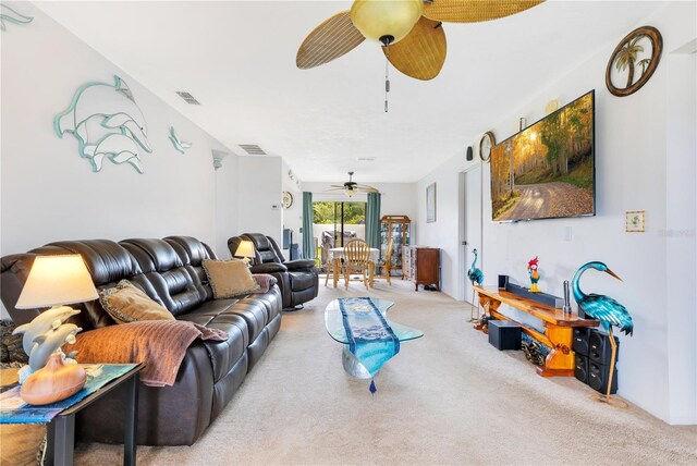 418 Falcon Ave, Edgewater, FL 32141 - carpeted living room featuring a ceiling fan