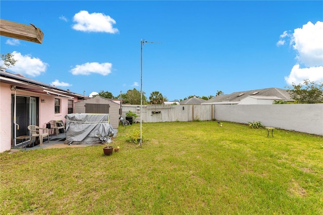 418 Falcon Ave, Edgewater, FL 32141 - view of yard featuring a storage shed, an outbuilding, and a patio area