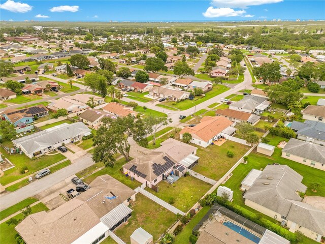 418 Falcon Ave, Edgewater, FL 32141 - aerial overview of property's location with nearby suburban area