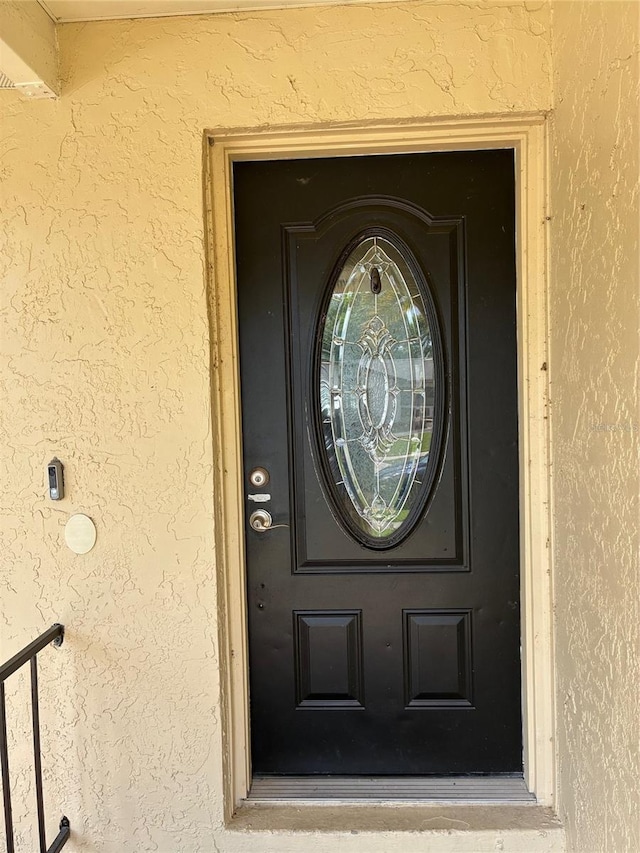 516 Hickorywood Ave, Altamonte Springs, FL 32714 - doorway to property with stucco siding